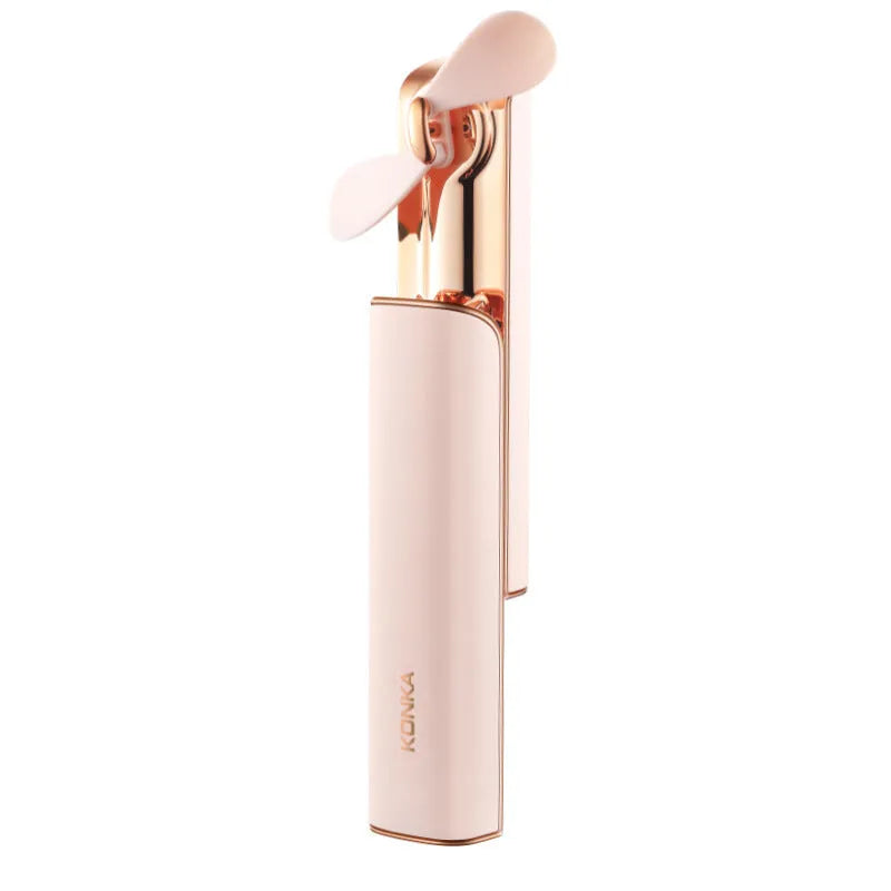Pink handheld folding mini fan with USB port and mechanical two-speed controls.