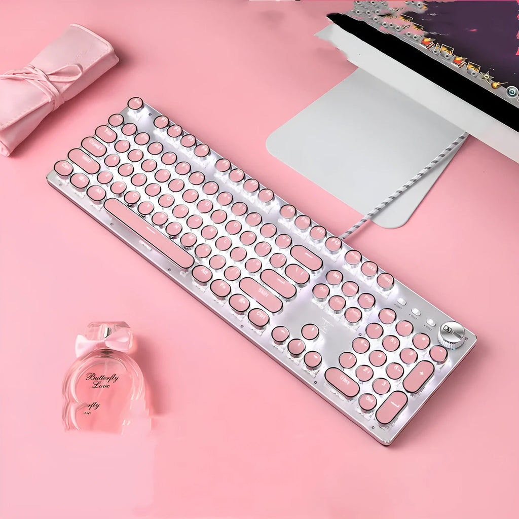 Queen Lipstick mechanical keyboard with green switches, silver bottom and pink accents