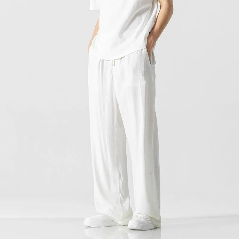 Men's bamboo fibre summer trousers with drawstring waist and cropped straight-leg design in solid colours