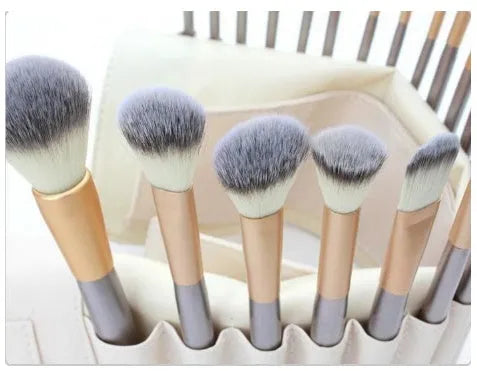 Persian makeup brush set with rice white bristles and champagne coloured handles showing multiple brush types