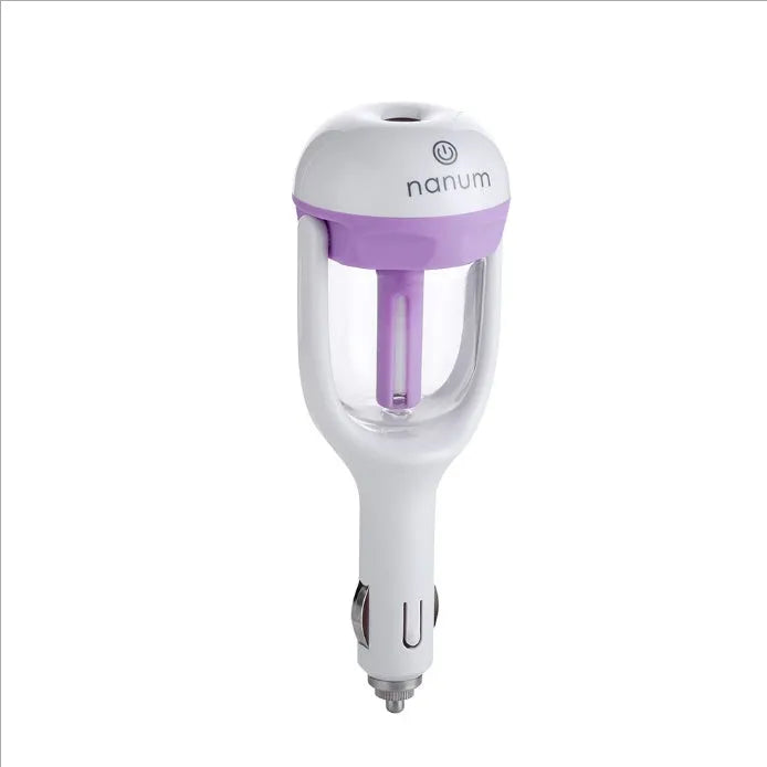 Compact blue car humidifier air purifier with essential oil diffuser function on car dashboard