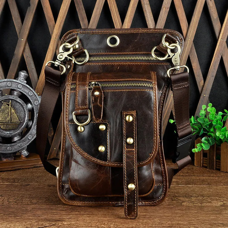 Men's black genuine cowhide leather punk-style fanny pack worn on the waist.