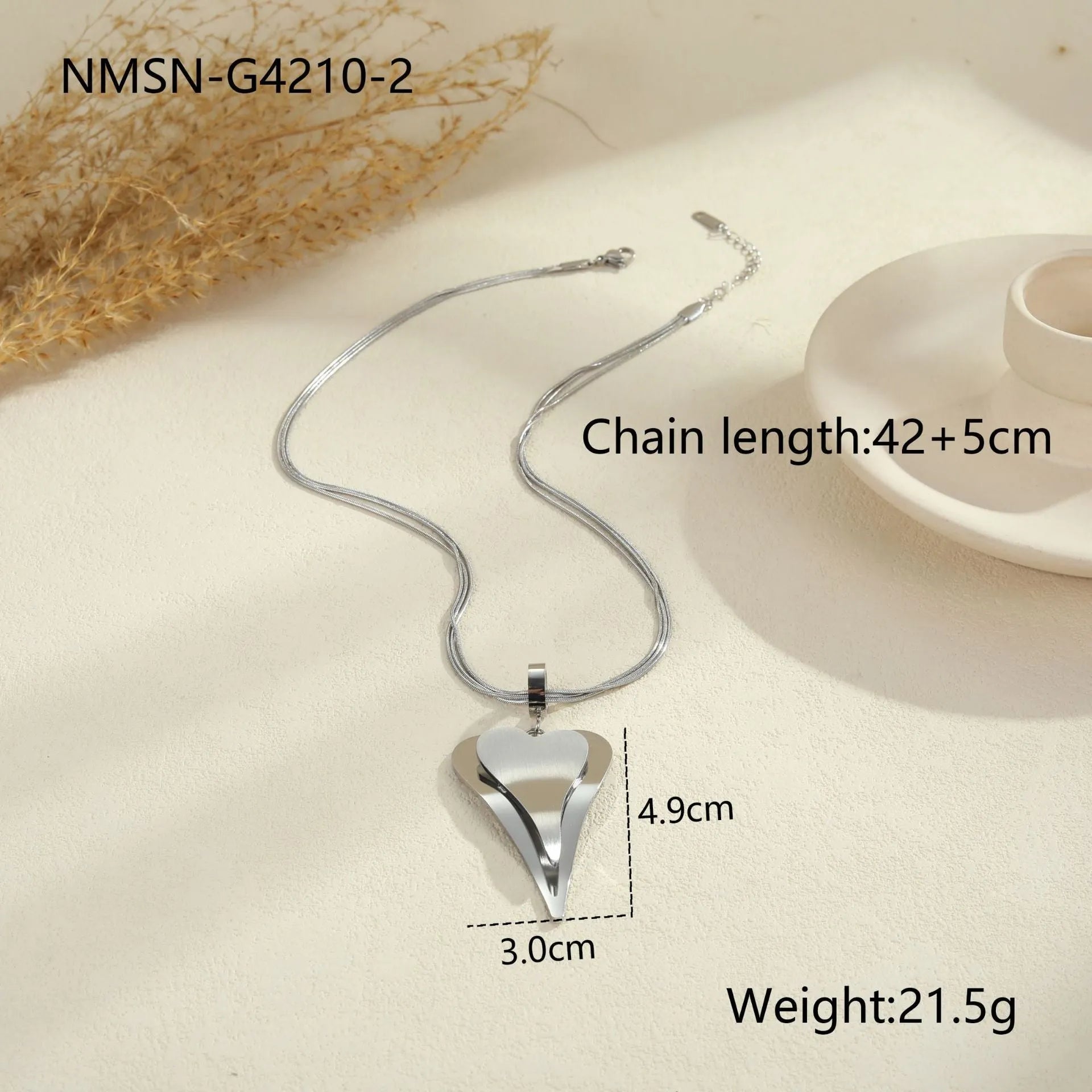 Gold stainless steel necklace with double heart pendant on snake bones chain