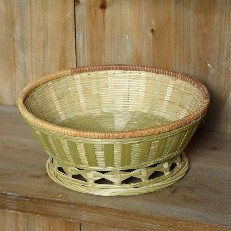 Handmade woven bamboo storage basket in natural colour showing traditional craftsmanship