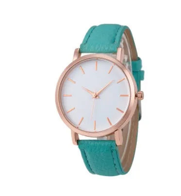 Square-faced quartz watch with an alloy case and PU leather strap on a wrist.