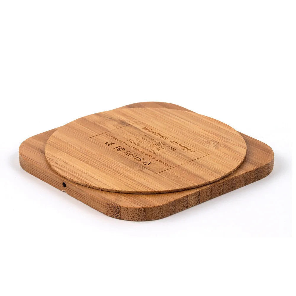 Brown wooden bamboo square 5W QI wireless charger on a desk