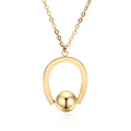 Stainless steel necklace with geometric pendant on a cross chain, in gold or silver colour.