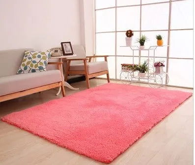Solid colour fluffy plush rectangle carpet showing soft pile and non-slip dotted bottom.