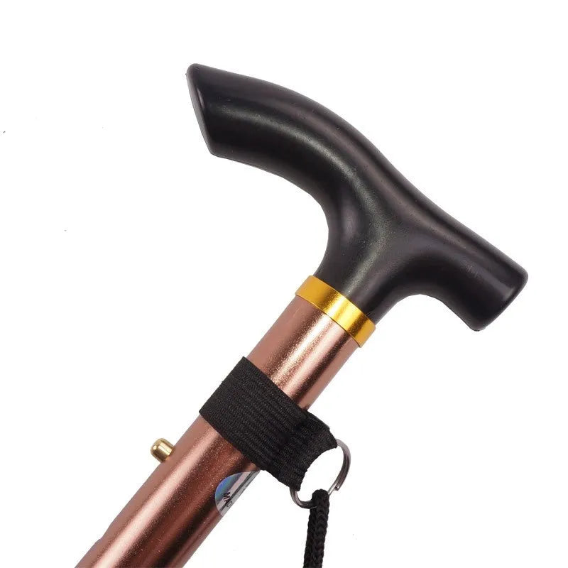 Aluminium folding walking stick extended to show adjustable length and non-slip rubber tip.
