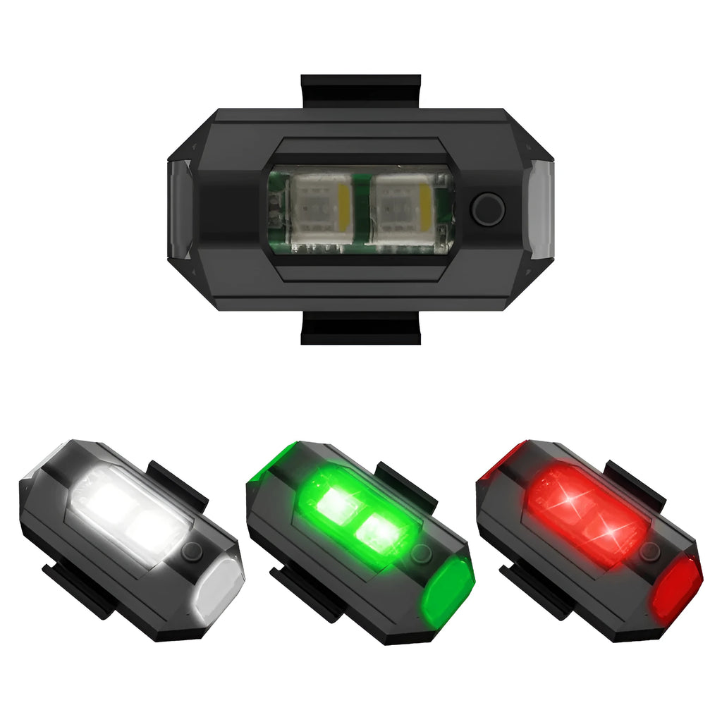 Drone signal light with RGB LED strobe, Type-C cable, fixing tape and ring belts on a table