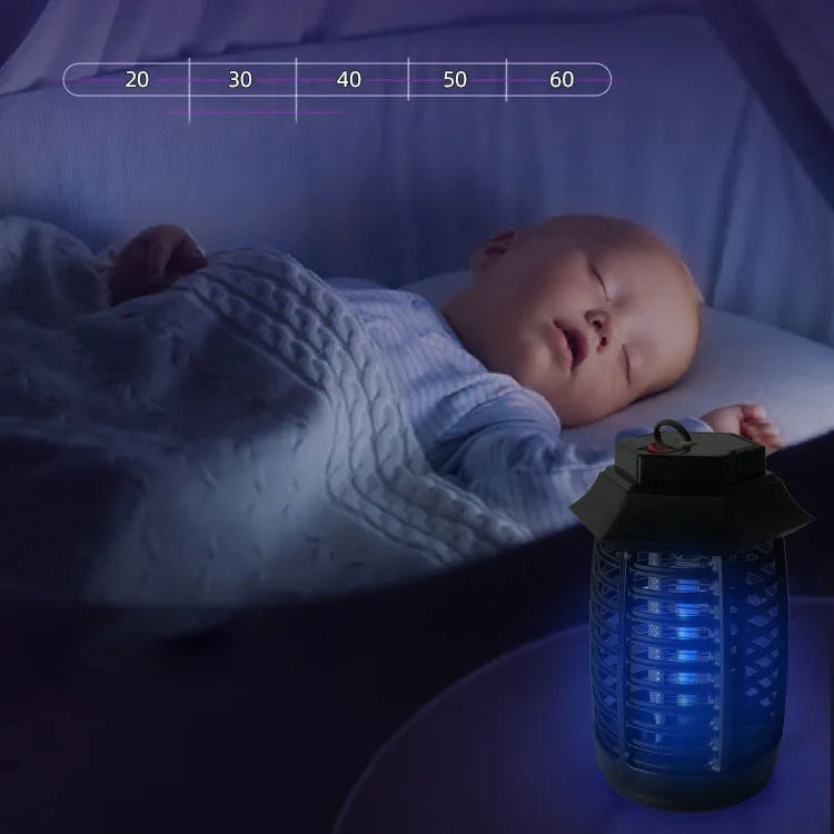 Black aromatherapy mosquito killer lamp on a table, showing its decorative low-light design.