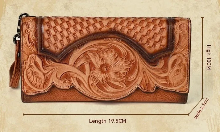 Chinese style embossed women's tri-fold wallet in genuine cowhide leather showing floral pattern detail