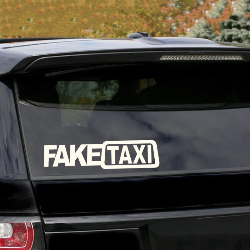 FAKE TAXI waterproof car warning sticker in black, white, or yellow, measuring 20 by 8 centimetres.