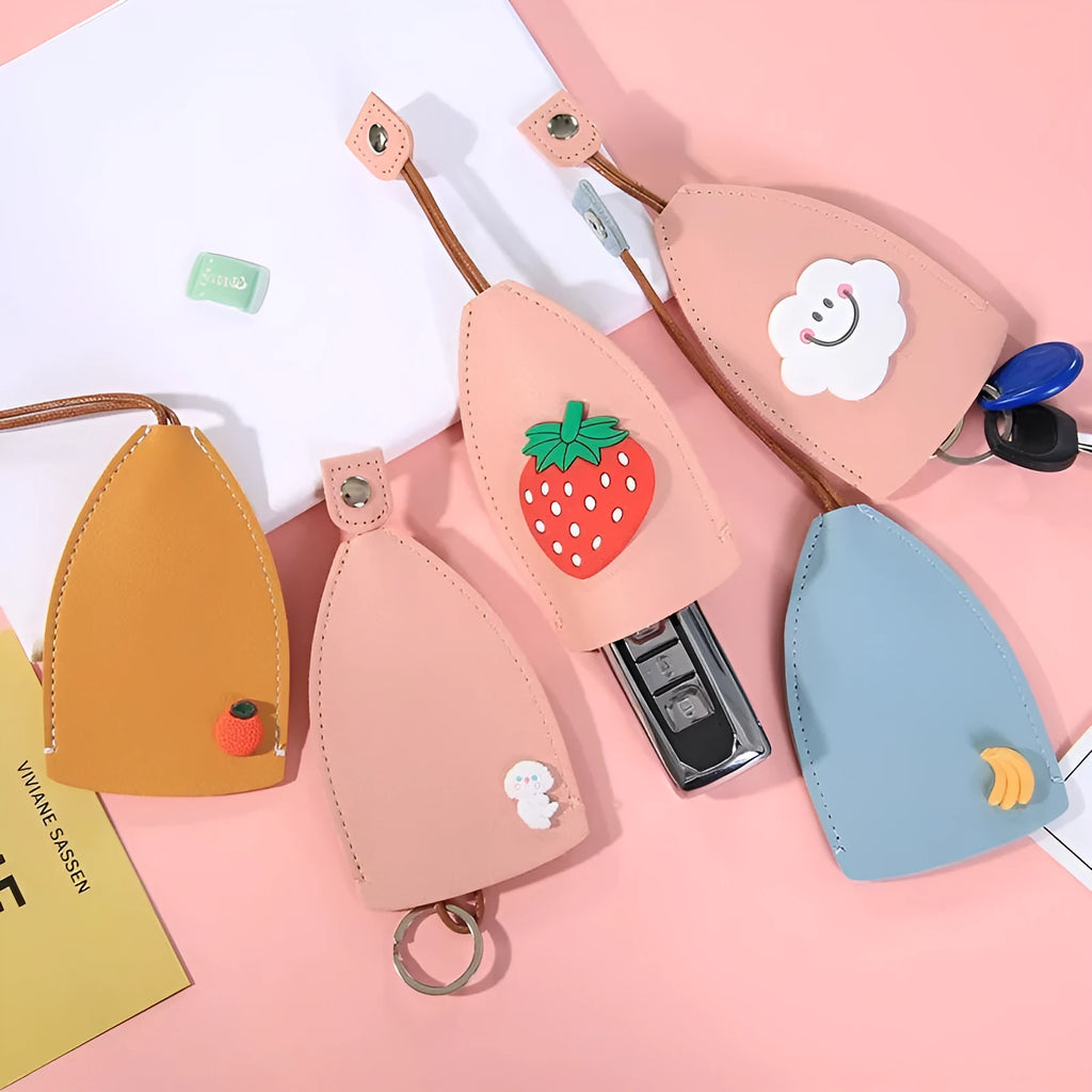 Cartoon pull-out key case in PU leather with colourful design, showing compact 14cm by 7.5cm dimensions