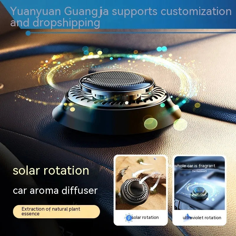 Solar kinetic car air freshener with rotating double rings on vehicle dashboard