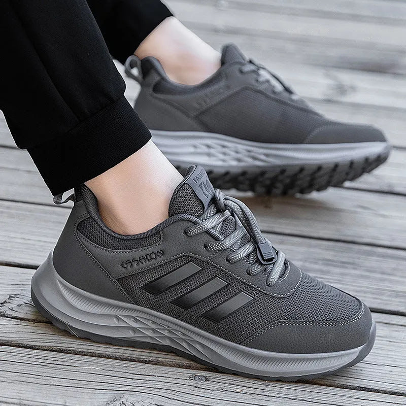 Breathable non-slip casual shoes with mesh upper and elastic band closure in black, dark grey, purple, and purplish red.