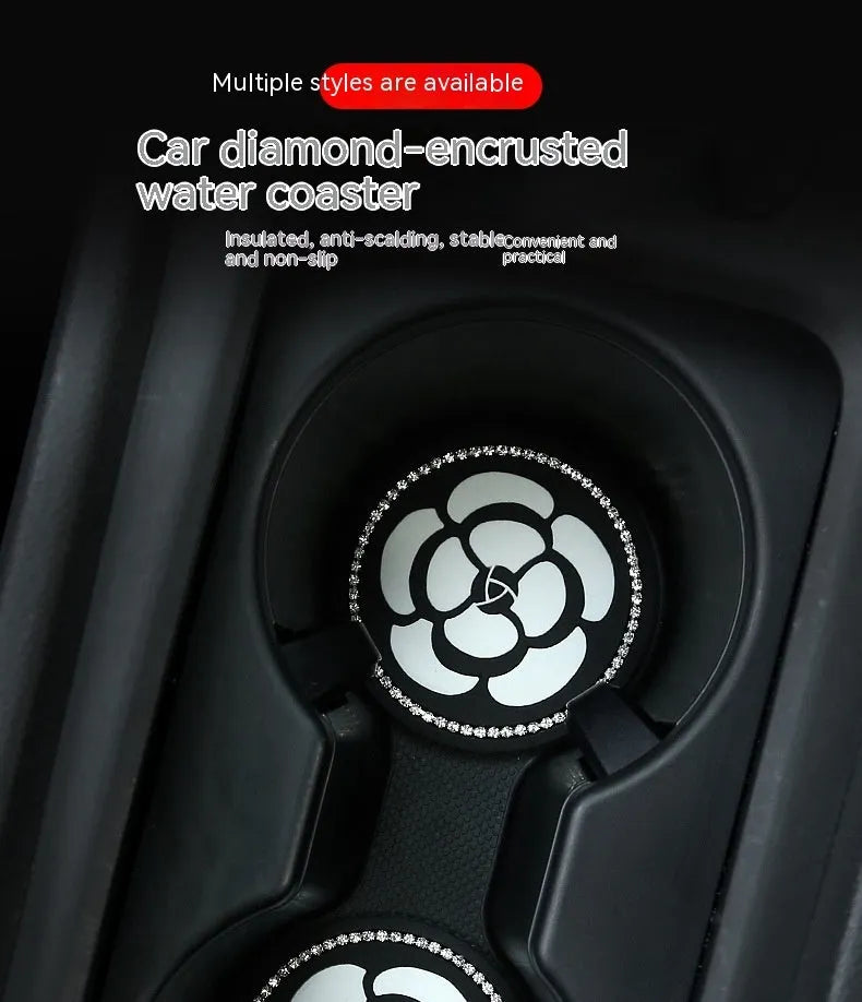 Black and white checkerboard pattern PVC car cup holder mat inserted in a vehicle centre console.