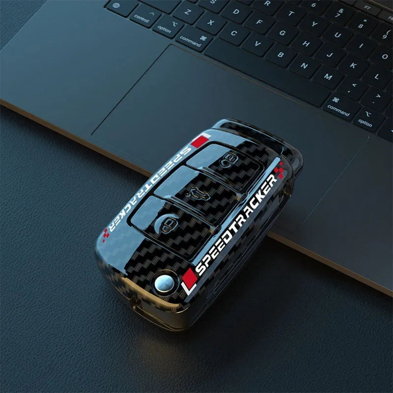 Carbon fibre style car key holder cover in white and carbon colour options with a small mirror.