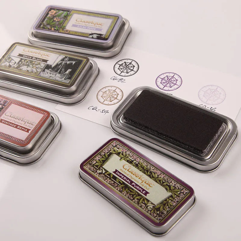 Rectangular notebook stamp pad with oily ink measuring 0.3 by 5.7 by 1.7 centimetres