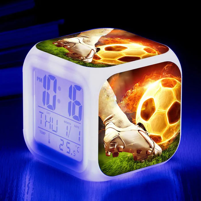 Square plastic alarm clock with football pattern and USB cable for students
