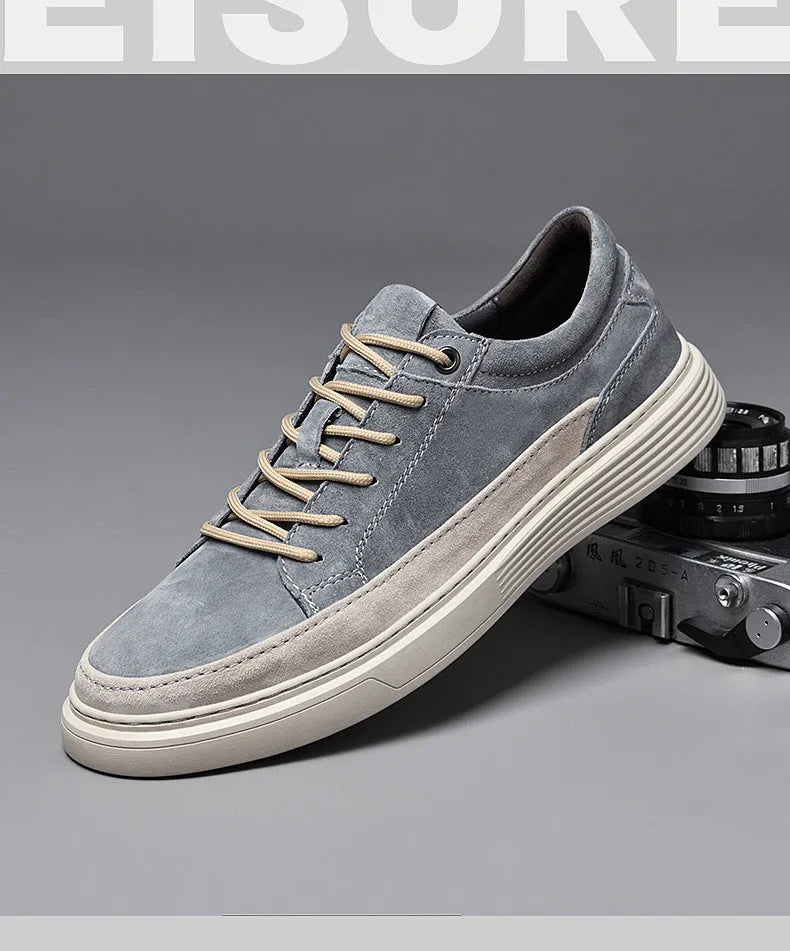 Men's grey and sand coloured low-top casual skate shoes with round toe and lace-up front.