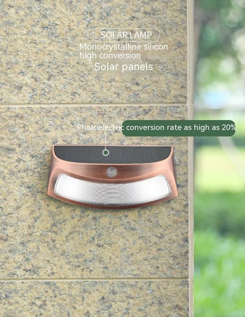 Solar outdoor retro wall lamp with smiling face design and IP65 rating for garden and villa use