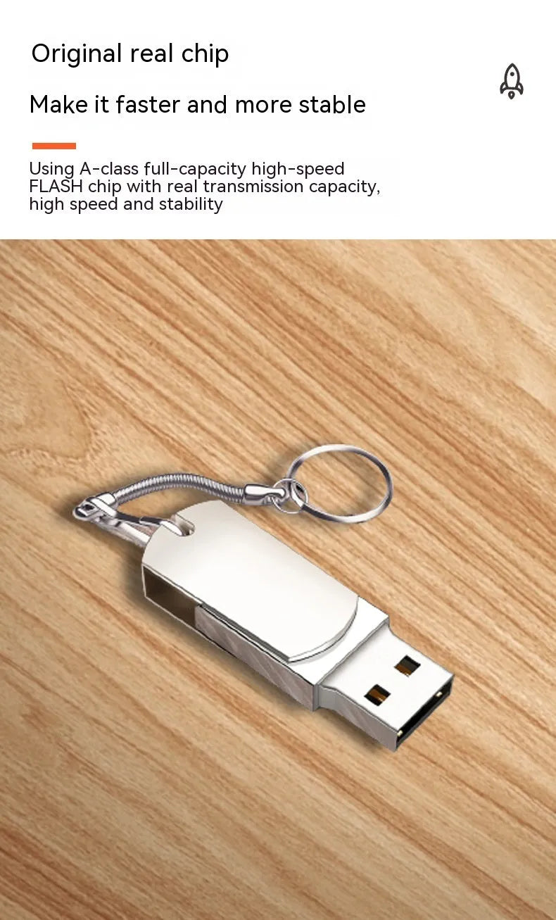 White small fat USB flash drive with rotating metal casing showing 16GB capacity
