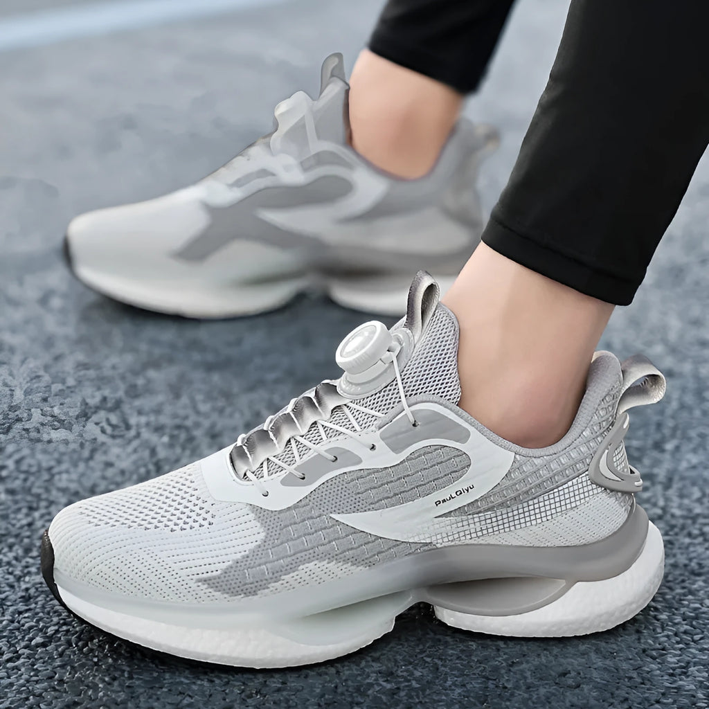 Men's white Korean style low-top running shoes with a rotating buckle closure and mesh upper.