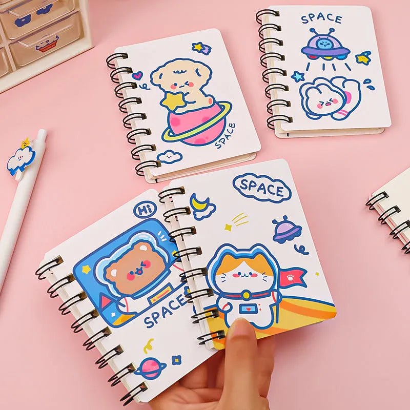 Astronaut themed pocket flipper notebook measuring 10.5 by 8 centimetres