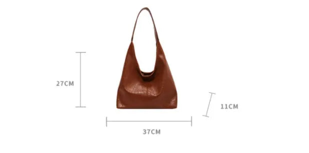 Casual soft leather shoulder bag with sandwich pockets in various colour options