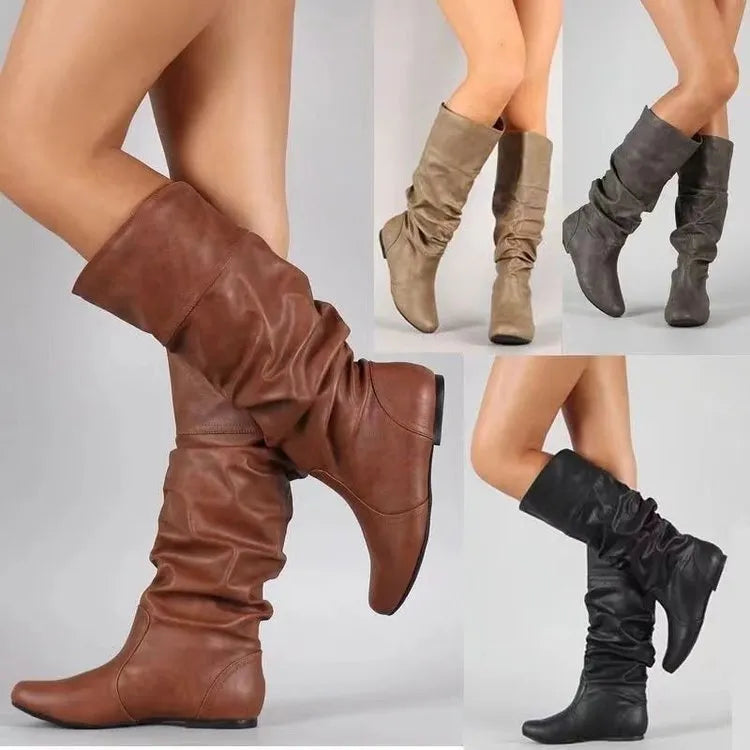 Women's slip-on flat ankle boots in artificial PU leather with high shaft and rubber sole