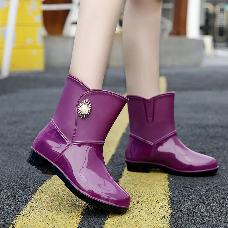 Women's middle tube rain boots in purple, black, and beige colours with non-slip soles