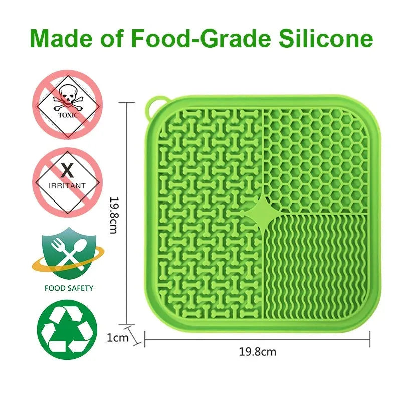 Blue silicone dog licking mat with textured surface and suction cups on back.