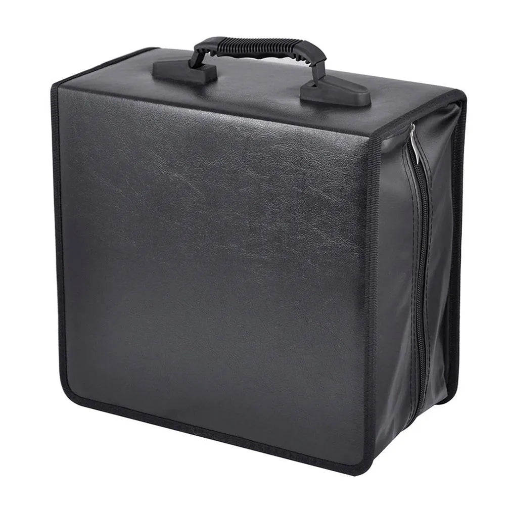 Black Oxford fabric CD and DVD storage binder with a zipper and top carry strap, open to show disc sleeves.
