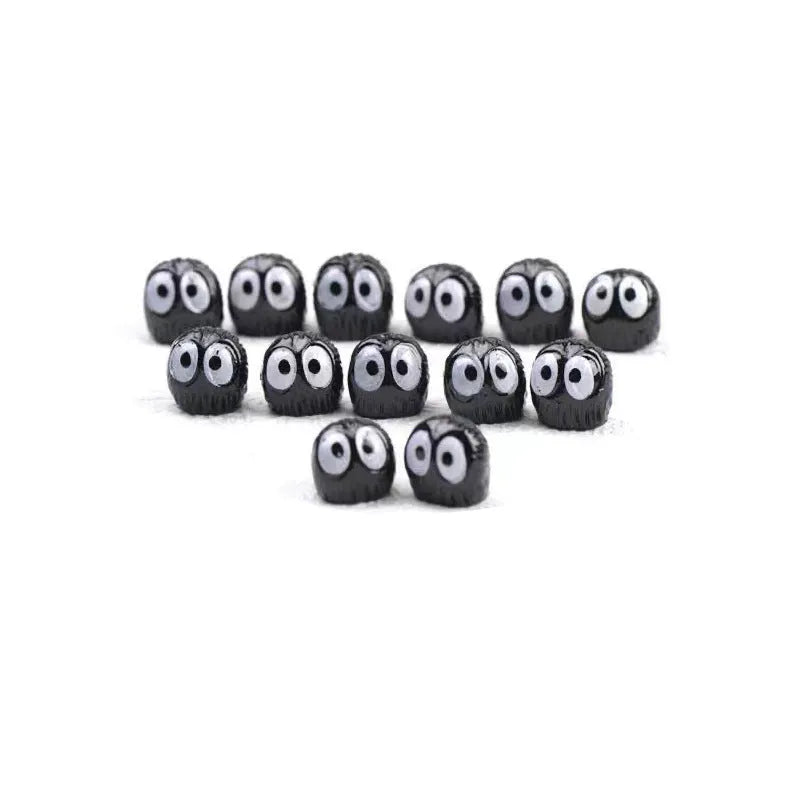 Small black resin briquette cartoon decoration for car interior with traceless glue