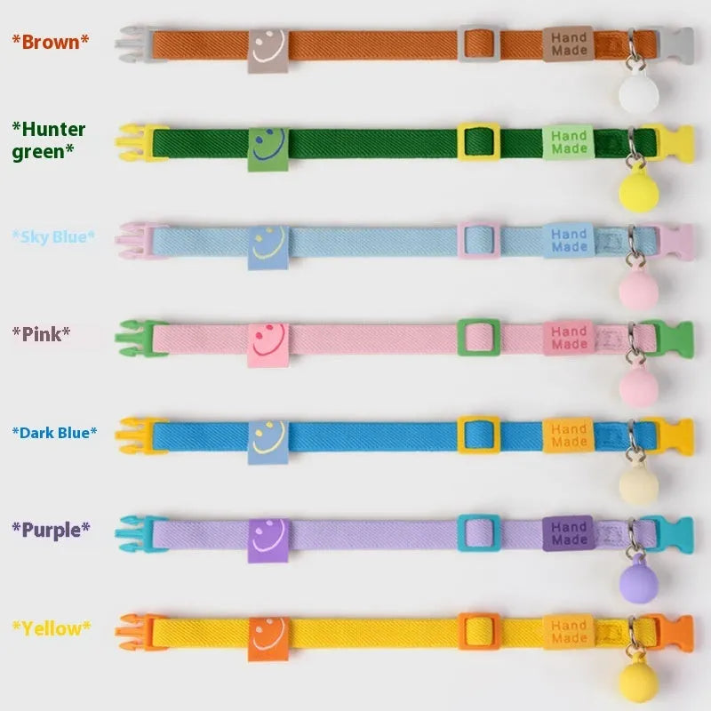 A high elasticity polyester pet collar for small dogs, shown in multiple solid colours on a white background.