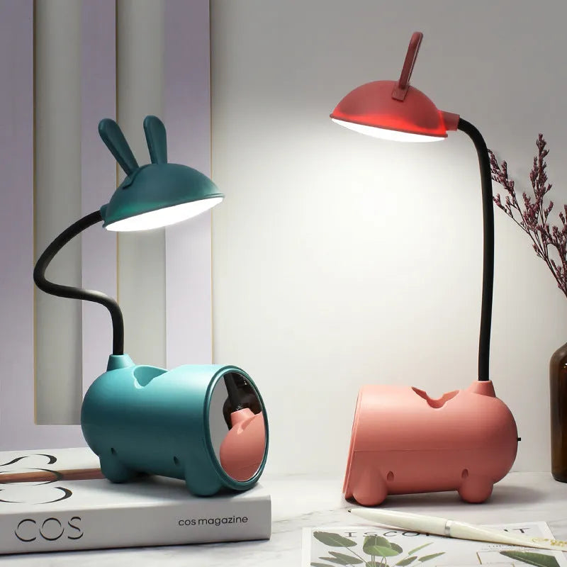 Green cartoon desk lamp with USB cable and pen storage compartment