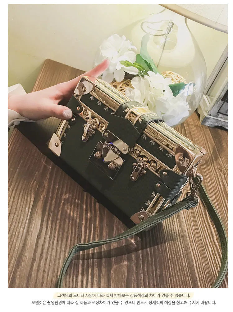 Women's hard PU leather shoulder bag with crossbody strap and flap design