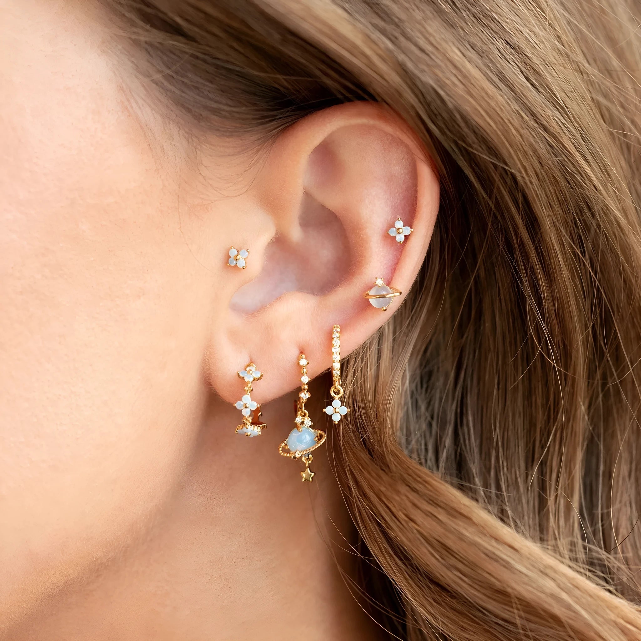 Blue protein flower nail ear studs with zircon mosaic details in gold or silver colour