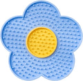 Flower-shaped silicone pet lick mat with suction cups in a choice of colours.