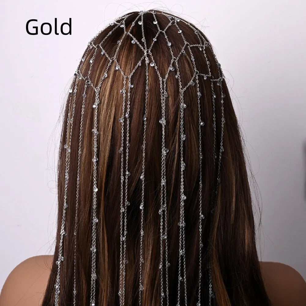 Gold and silver rhinestone mesh headband with hanging tassel details.