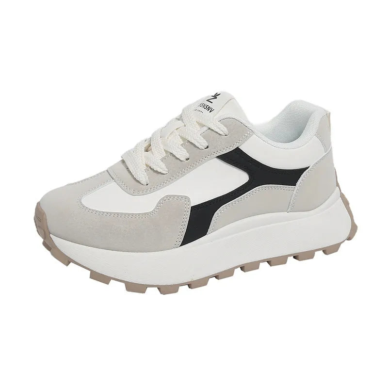 Women's low-top platform sports shoes in solid colours with lace-up front and mesh lining.
