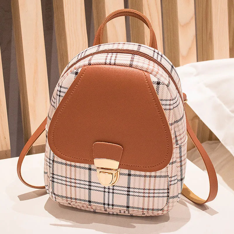 A one shoulder diagonal crossbody phone bag made from PU leather in one of five colour options.