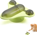 Blue interactive pet puzzle toy with treat cabin, bell, and catnip attachments on suction cup base