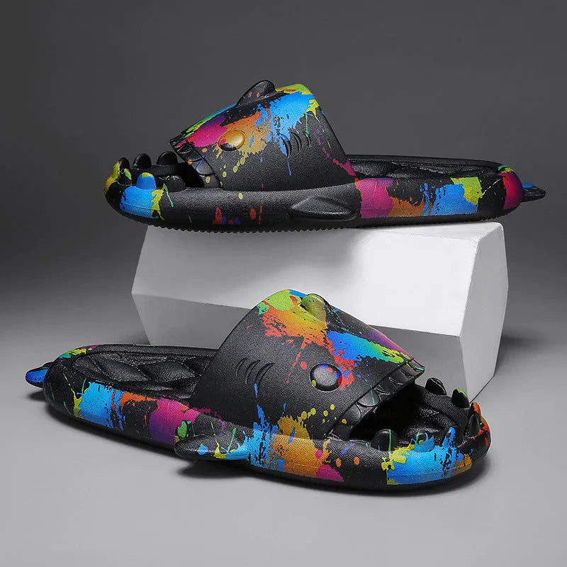 Open-toe EVA foam home slippers with shark design in beige, black, grey, and white colours.