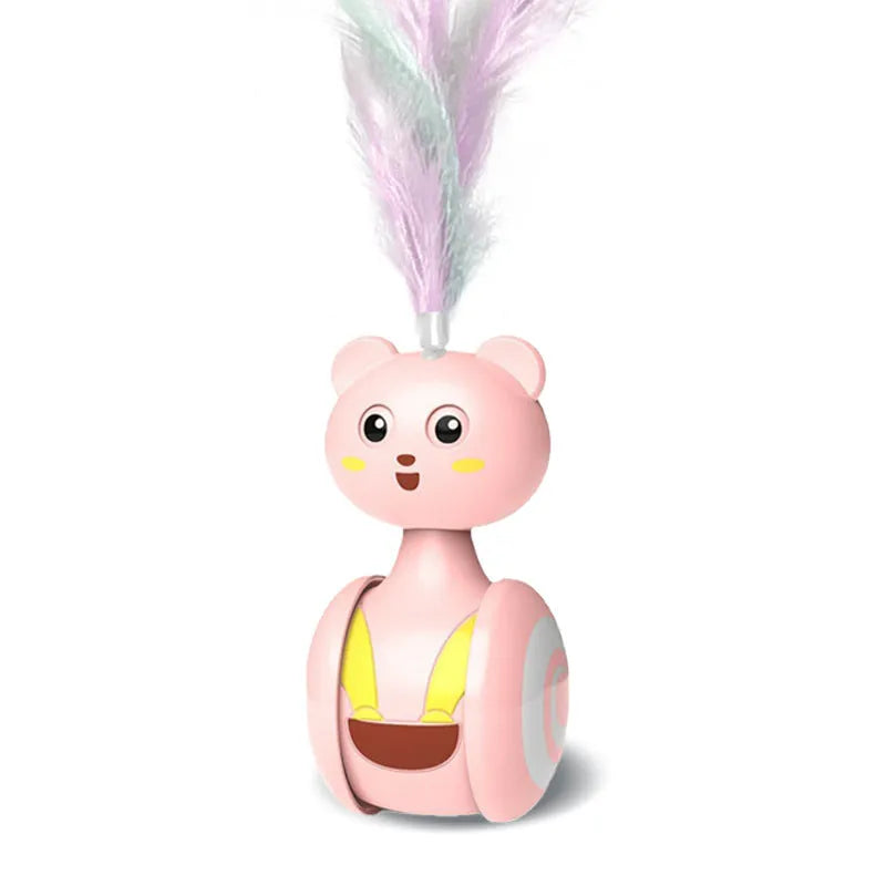 Rotating cat toy with feather wand attachment in pink colour showing tumbler mechanism