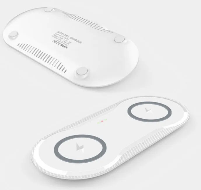 Black and white dual wireless charger charging two phones simultaneously with type-C cable