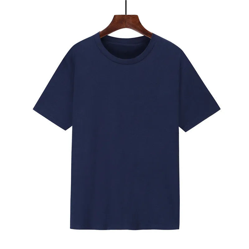 Men's loose-fit cotton t-shirt in black, shown on a model, with short sleeves.