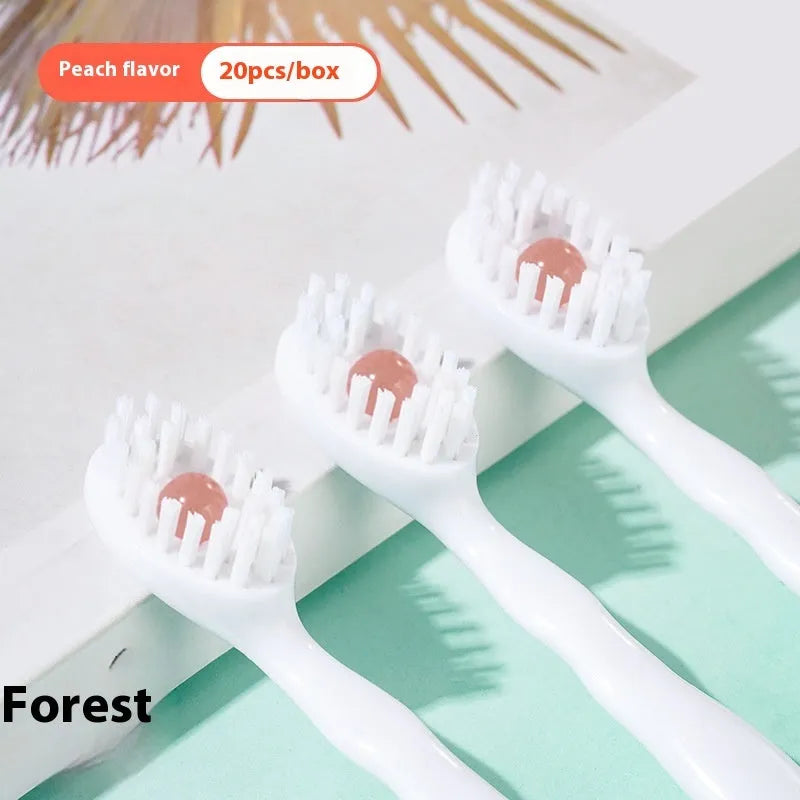 Box of Bead disposable toothbrushes showing mint, peach, and plum green tea flavour options.