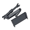 Black car phone holder mounted on vehicle rear seat base holding tablet for navigation